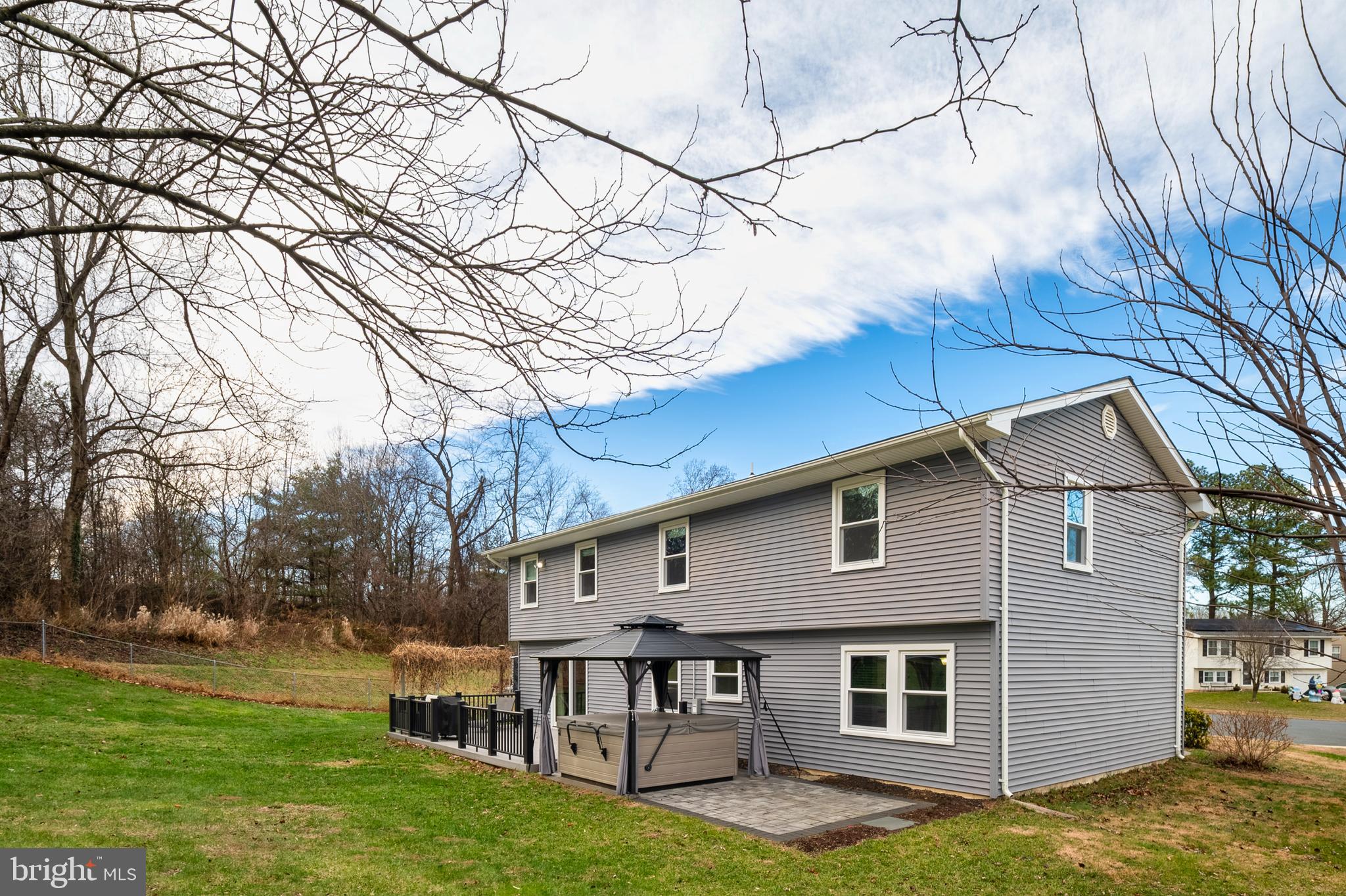 2472 Wintergreen Way Gambrills, MD 21054 - Photo 36 of 55 a view of a house with a yard