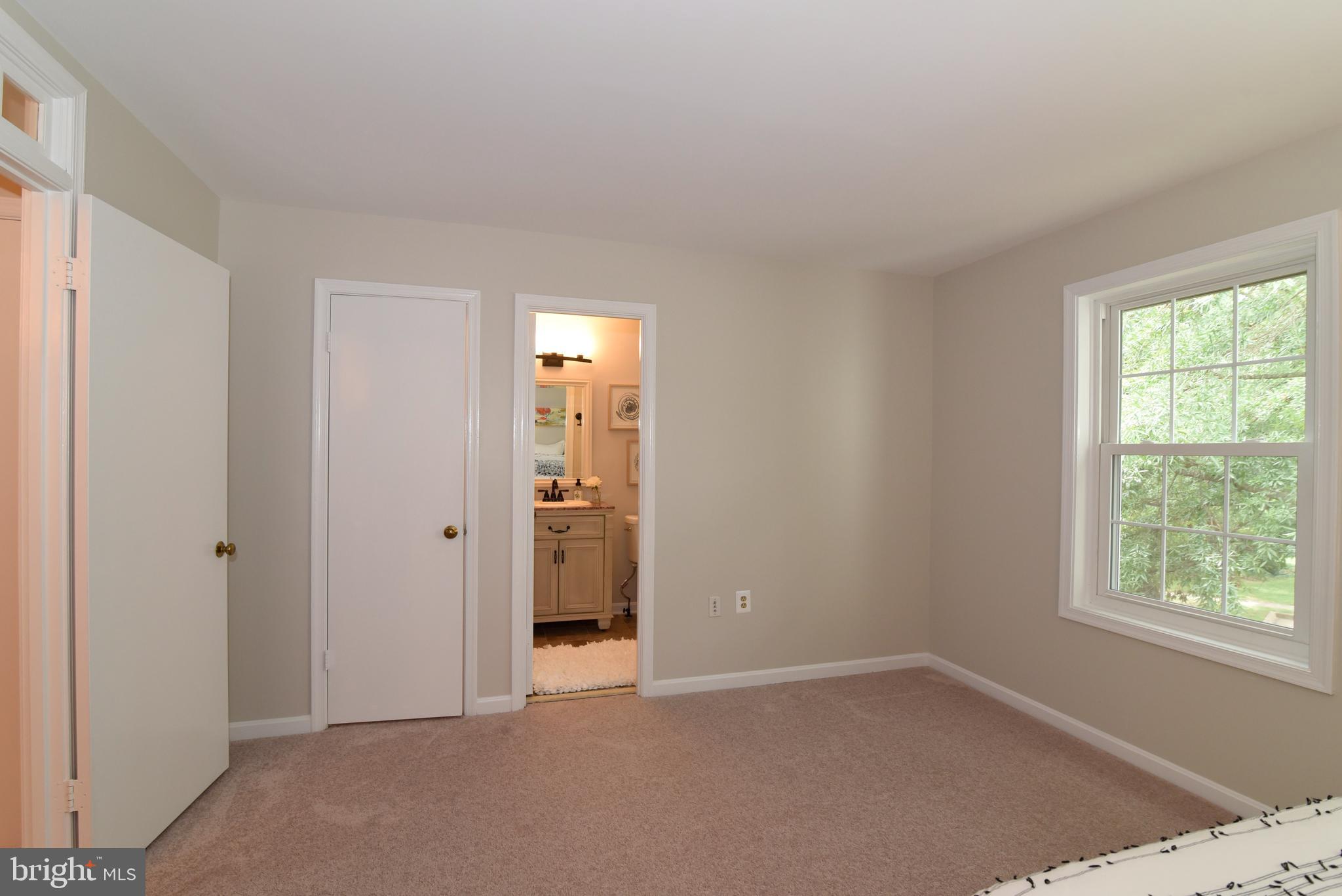 11940 Sentinel Point Court Reston, VA 20191 - Photo 24 of 43 Primary bedroom with en suite.