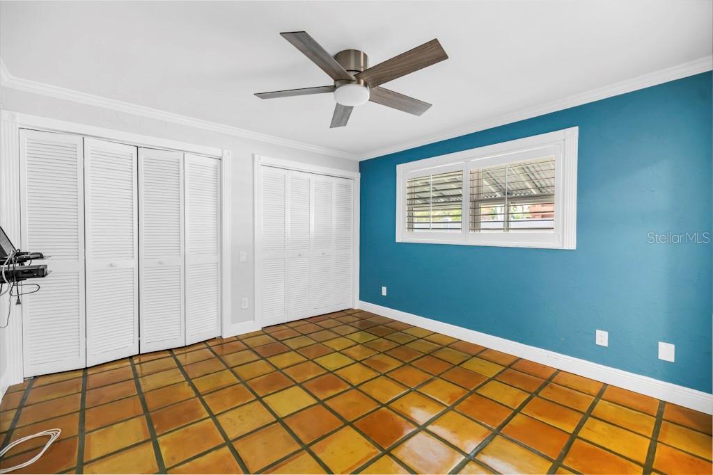 11174 90th Terrace Seminole, FL 33772 - Photo 25 of 35 a view of a livingroom with a ceiling fan and window