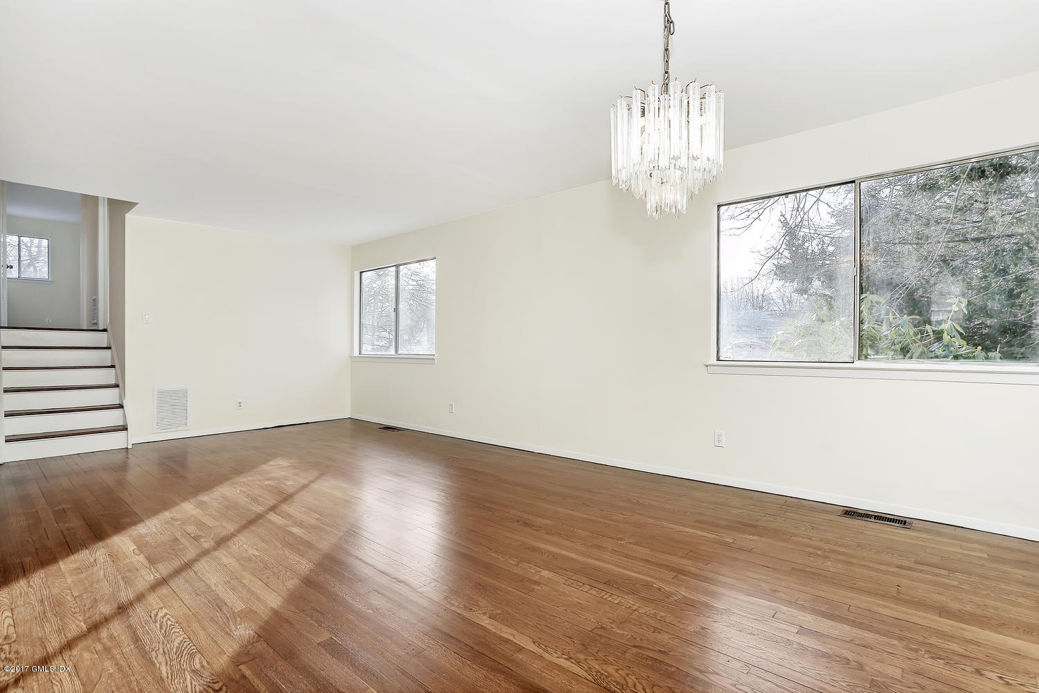 6 Amherst Road Riverside, CT 06878 - Photo 15 of 22 a view of an empty room with wooden floor and a window