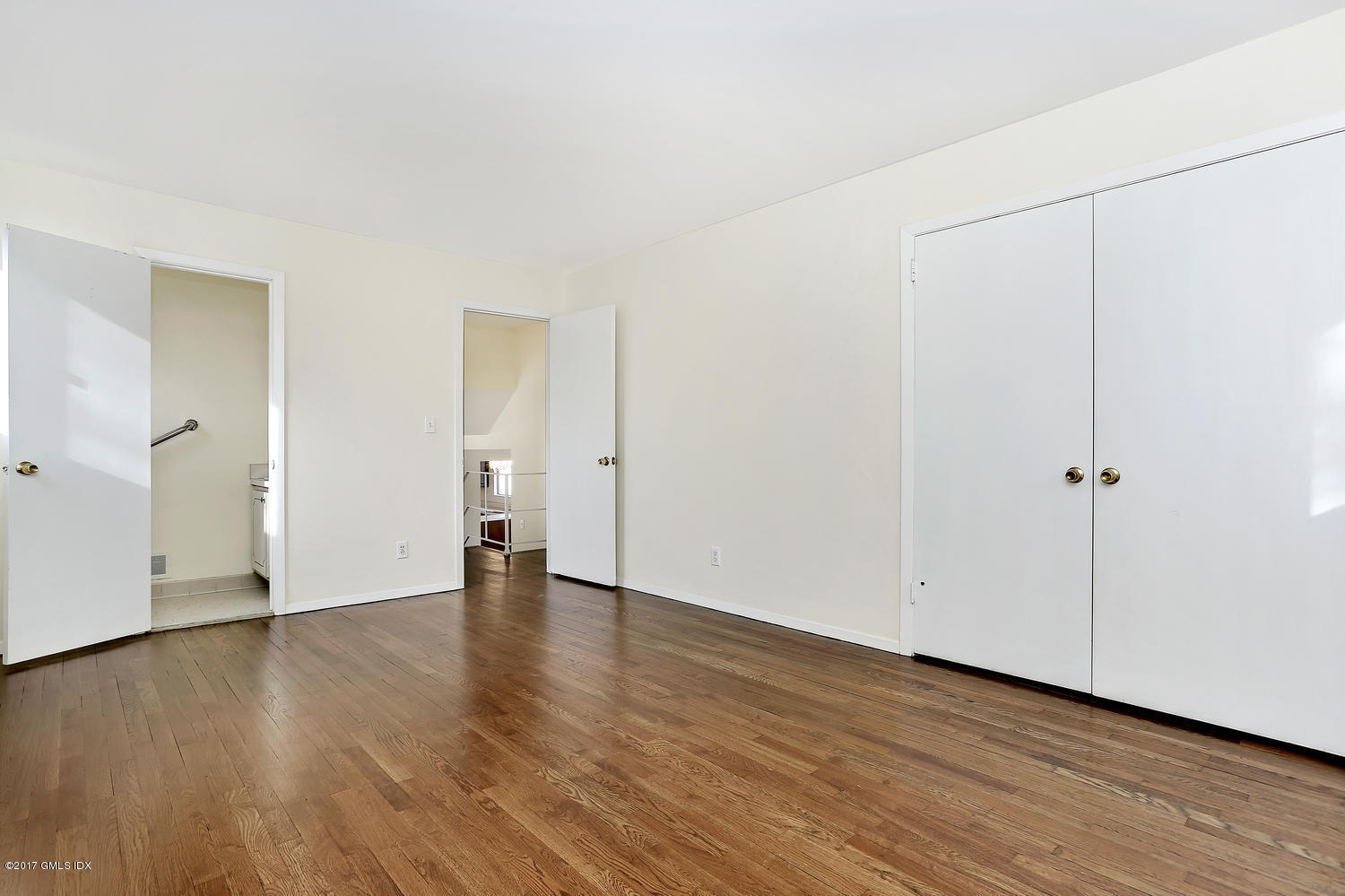 6 Amherst Road Riverside, CT 06878 - Photo 17 of 22 a view of an empty room and wooden floor