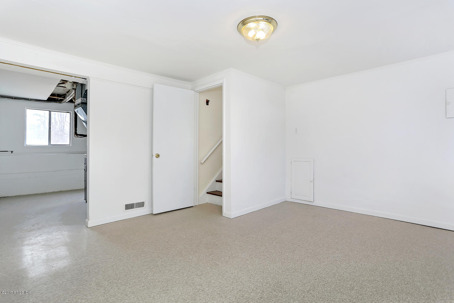 6 Amherst Road Riverside, CT 06878 - Photo 20 of 22 an empty room with windows