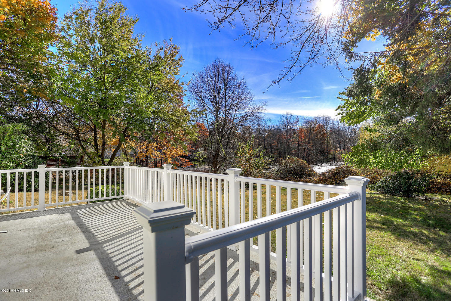 6 Amherst Road Riverside, CT 06878 - Photo 2 of 22 a view of balcony with furniture and trees around