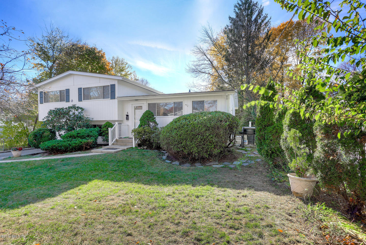 6 Amherst Road Riverside, CT 06878 - Photo 22 of 22 a front view of a house with garden