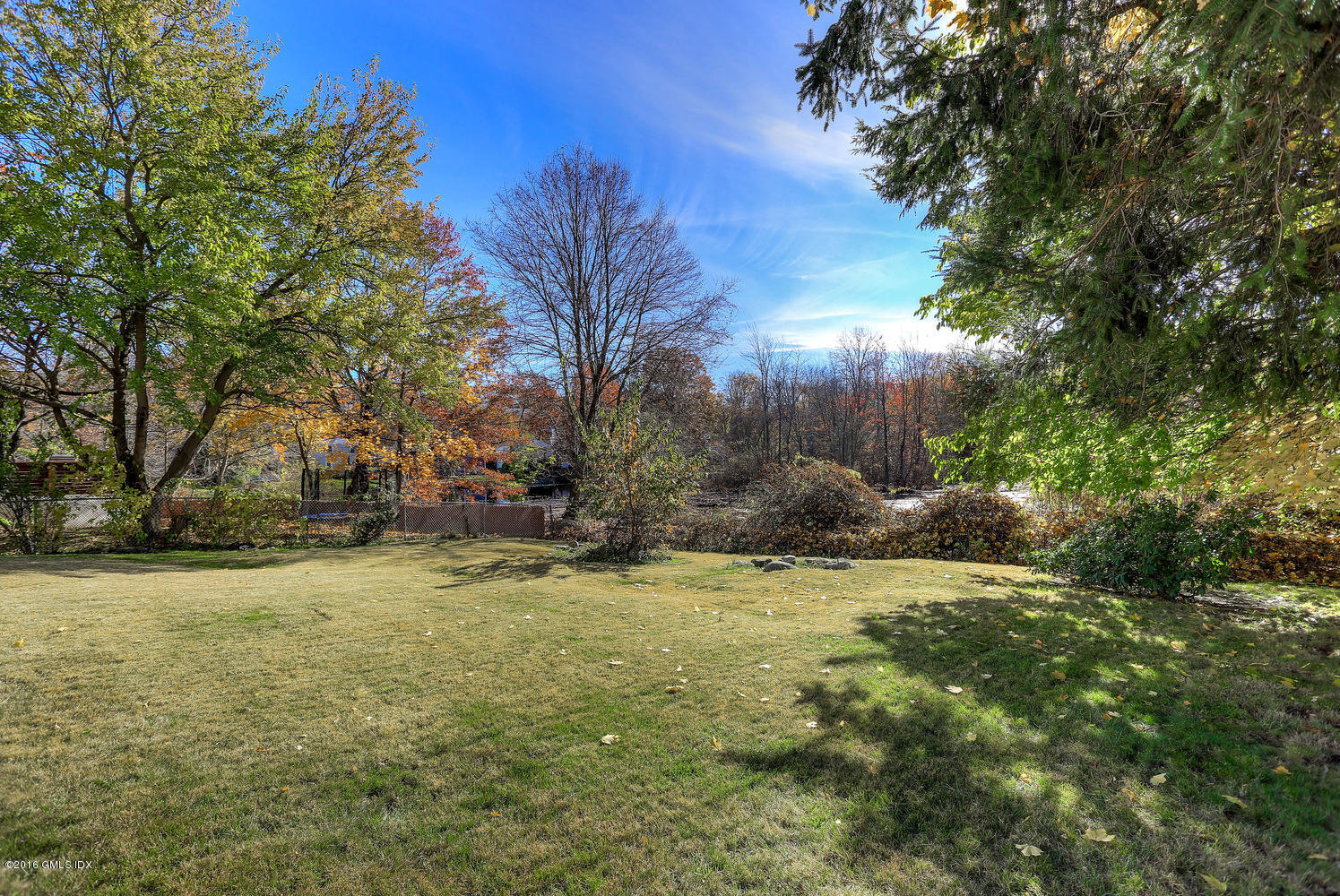 6 Amherst Road Riverside, CT 06878 - Photo 3 of 22 a view of a yard with a tree