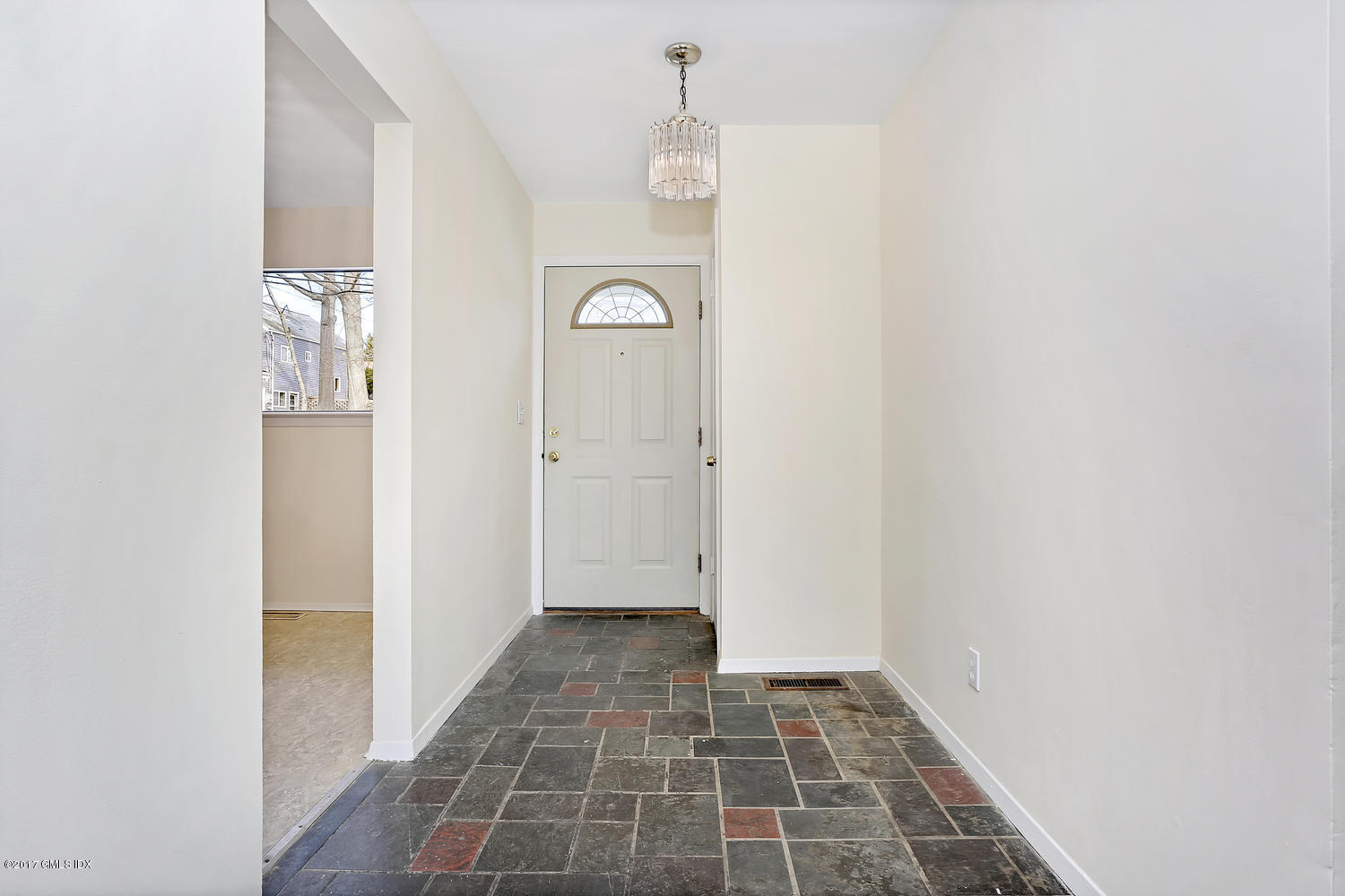 6 Amherst Road Riverside, CT 06878 - Photo 9 of 22 a view of a hallway with wooden floor and a bathroom