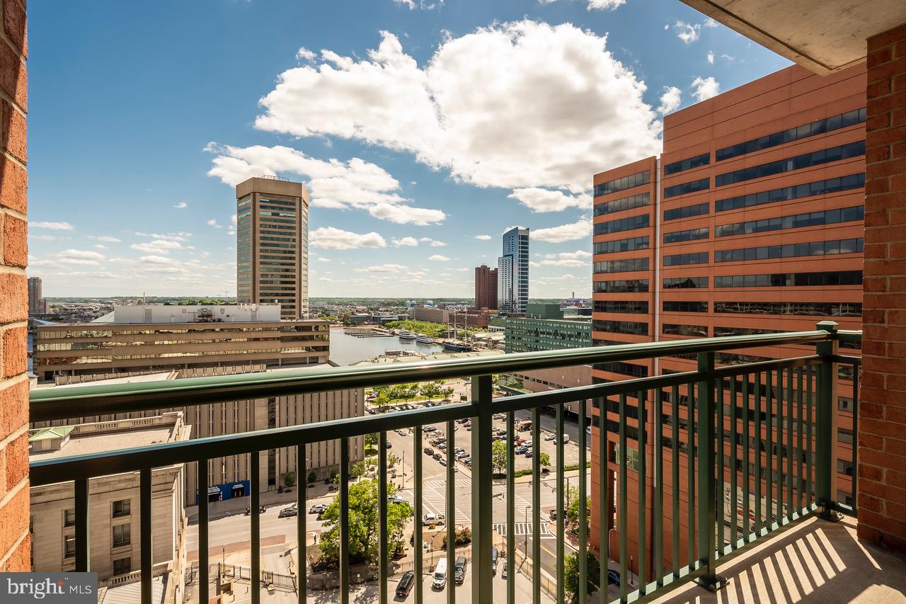 414 Water Street, Unit 1502 Baltimore, MD 21202 - Photo 19 of 32 a city view from a balcony
