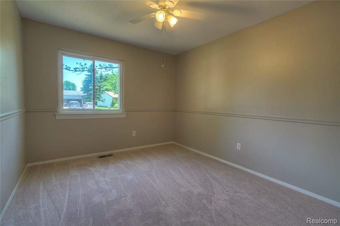 736 Dressler Lane Rochester, MI 48307 - Photo 11 of 20 Bedroom number two in this Rochester Hills Ranch.