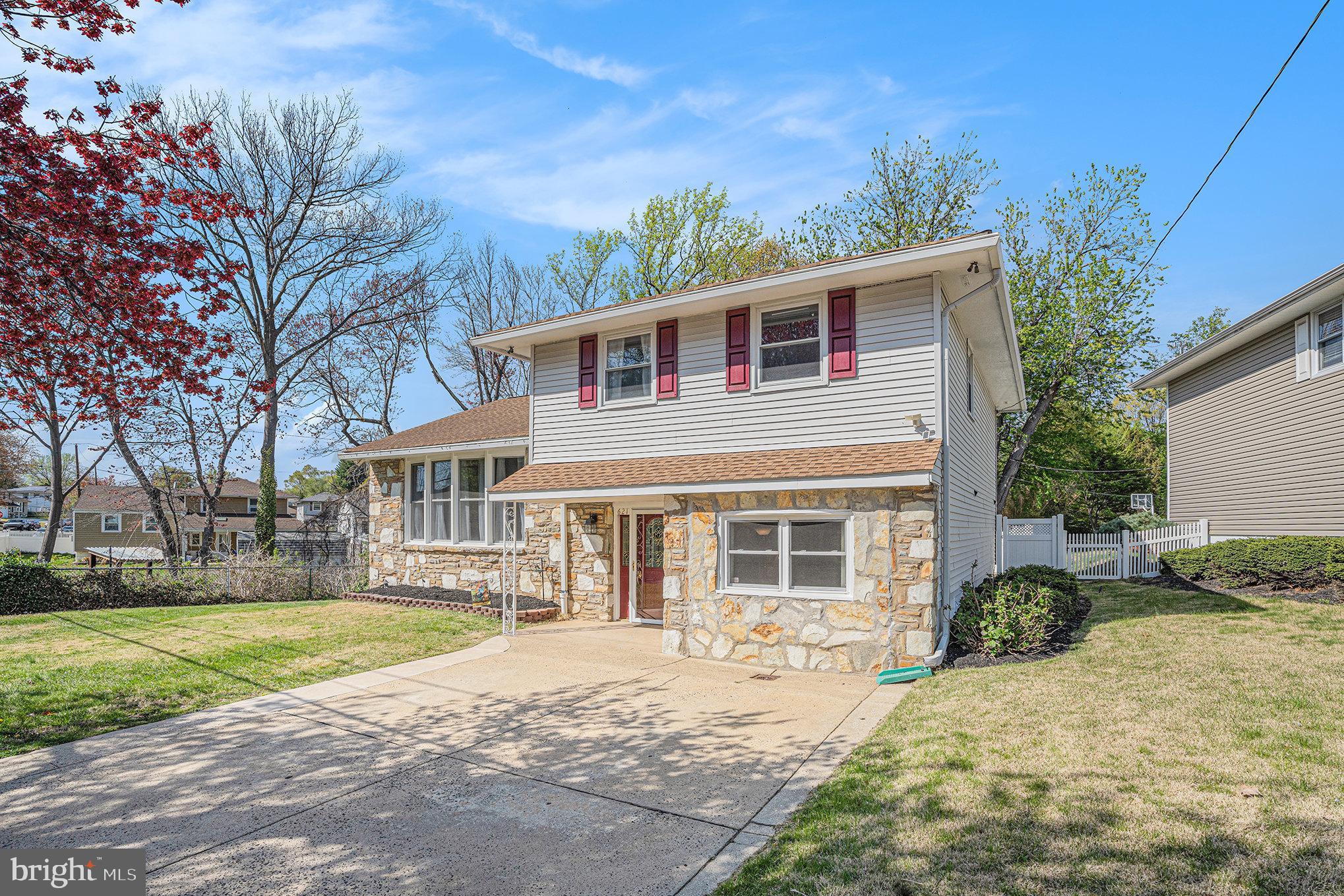 621 Kismet Road Philadelphia, PA 19115 - Photo 2 of 38 a front view of a house with a yard
