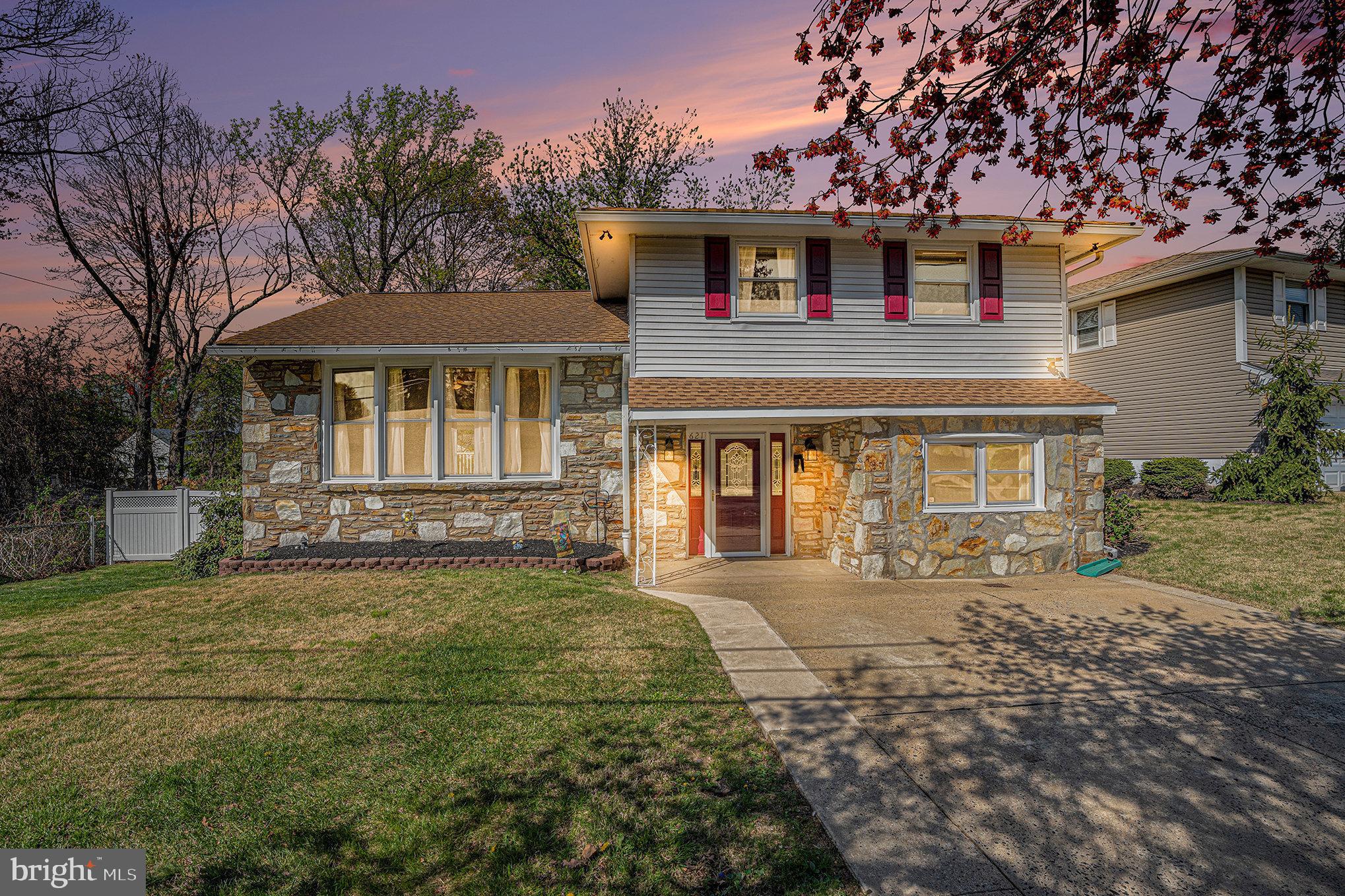 621 Kismet Road Philadelphia, PA 19115 - Photo 3 of 38 front view of a house with a yard