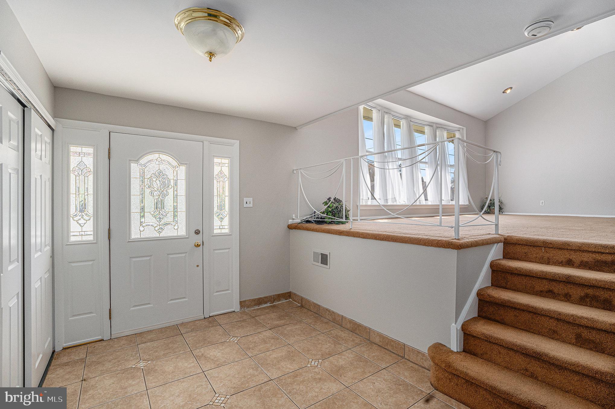 621 Kismet Road Philadelphia, PA 19115 - Photo 4 of 38 a view of entryway with wooden floor and window