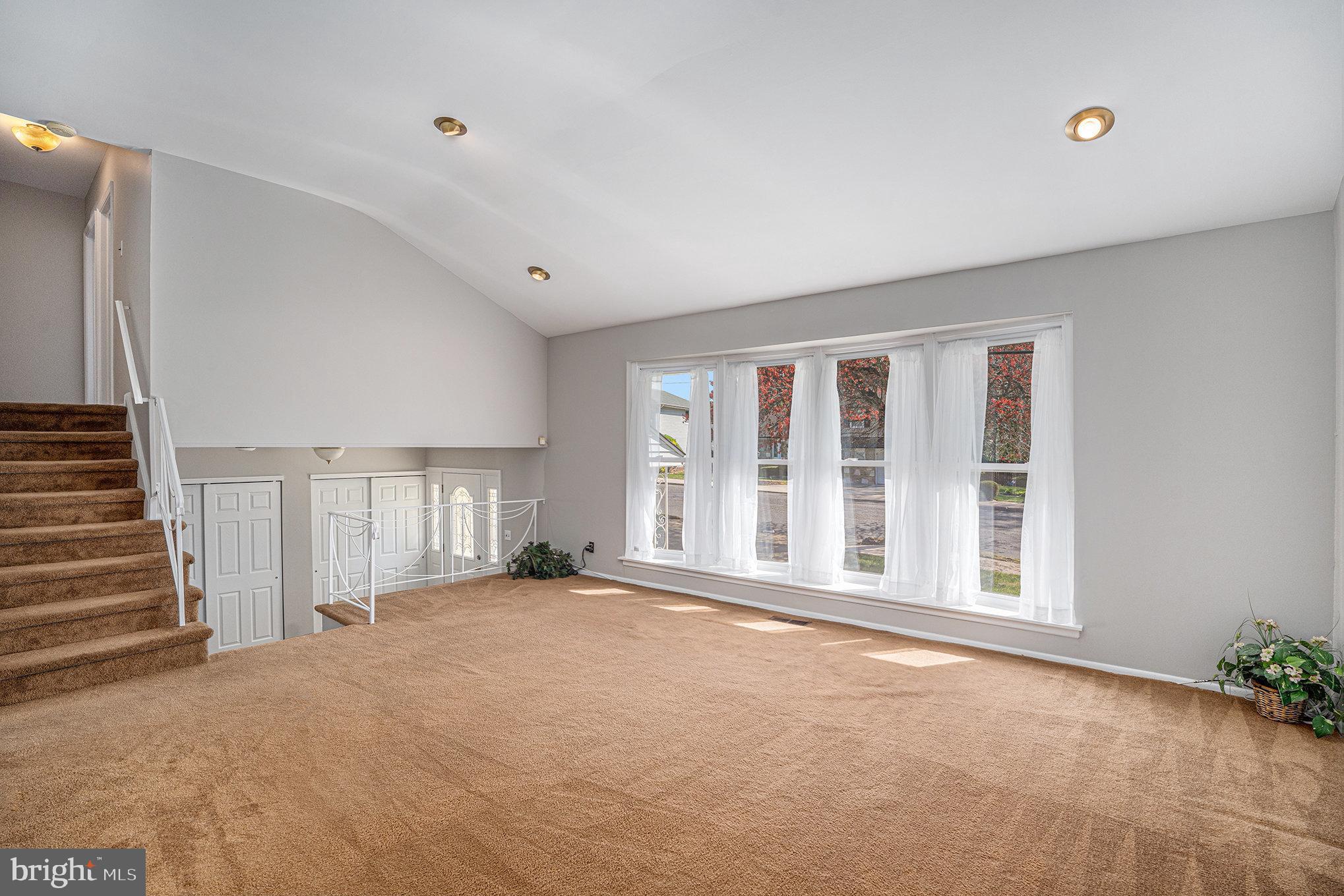 621 Kismet Road Philadelphia, PA 19115 - Photo 9 of 38 a view of an empty room with a window