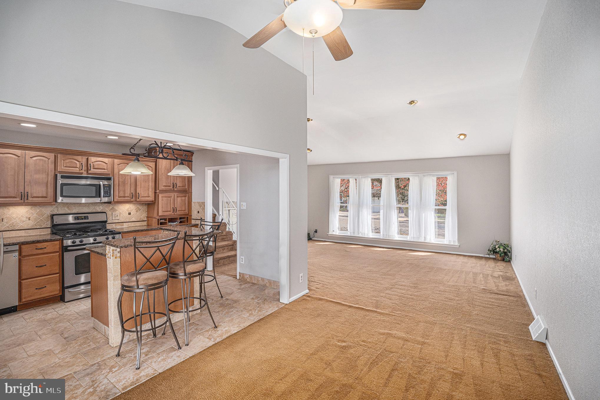 621 Kismet Road Philadelphia, PA 19115 - Photo 10 of 38 a view of a dining room with furniture window and wooden floor