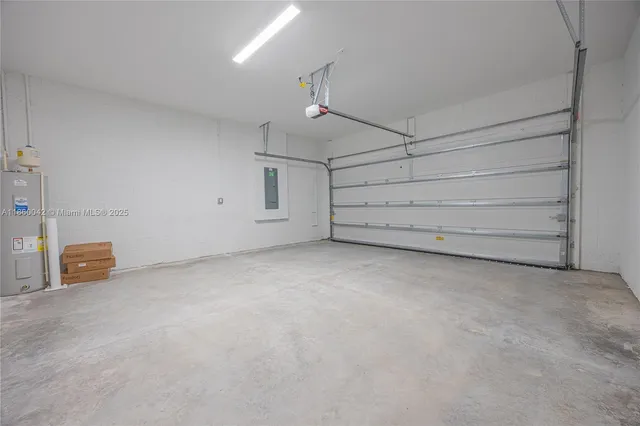 a bathroom with a sink mirror and toilet