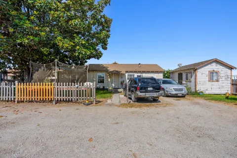 a view of a house with a patio