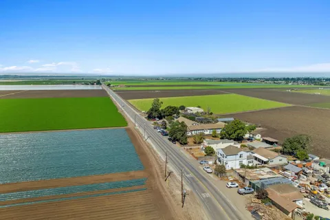 a view of swimming pool with a balcony