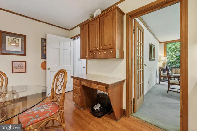 a bathroom with a sink mirror and toilet