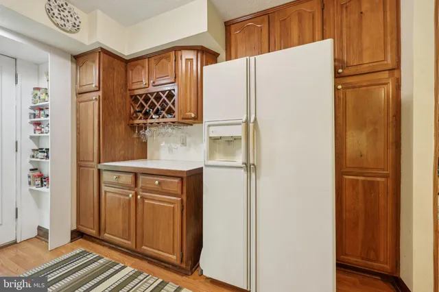 a view of a hallway with windows