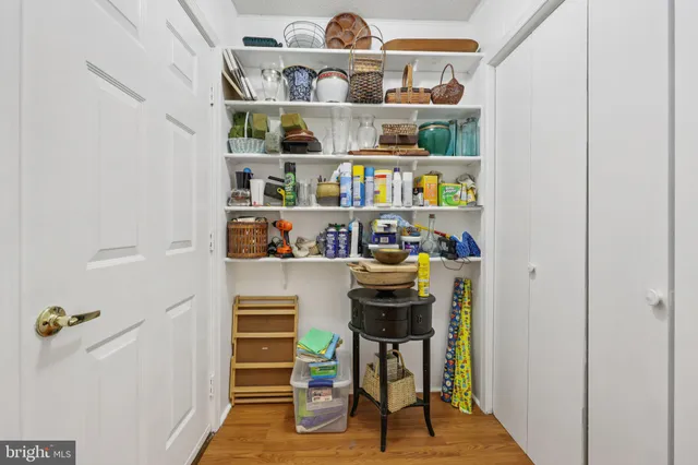 a view of a hallway with workspace