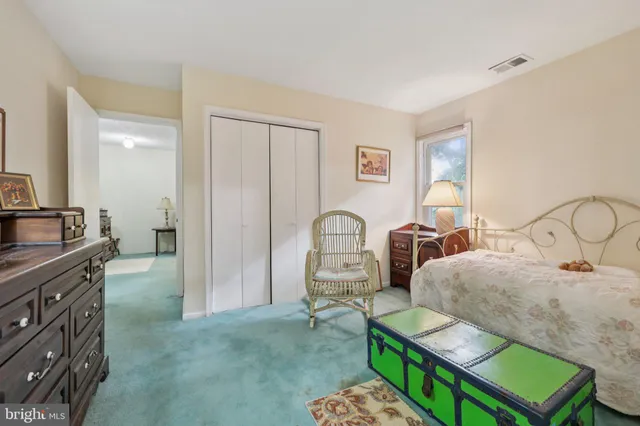 a bathroom with a tub sink and a shower