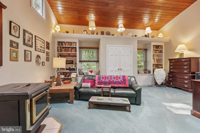 a view of a balcony with wooden floor