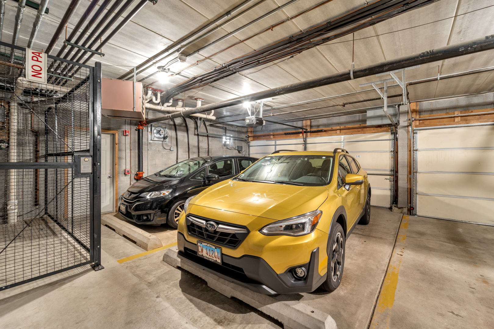 717 North 5th Avenue, Unit 302 Addison, IL 60101 - Photo 16 of 25 a car parked in a garage