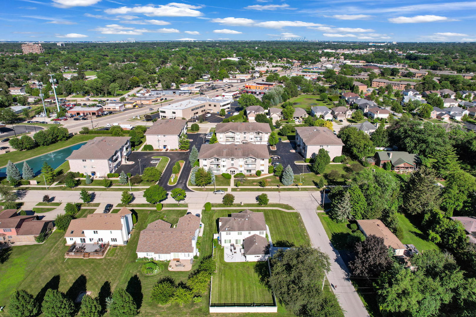 717 North 5th Avenue, Unit 302 Addison, IL 60101 - Photo 25 of 25 an aerial view of residential houses with outdoor space
