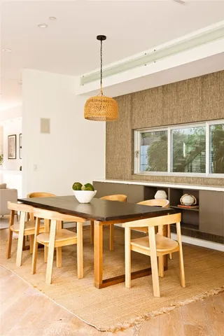 a view of a dining room with furniture