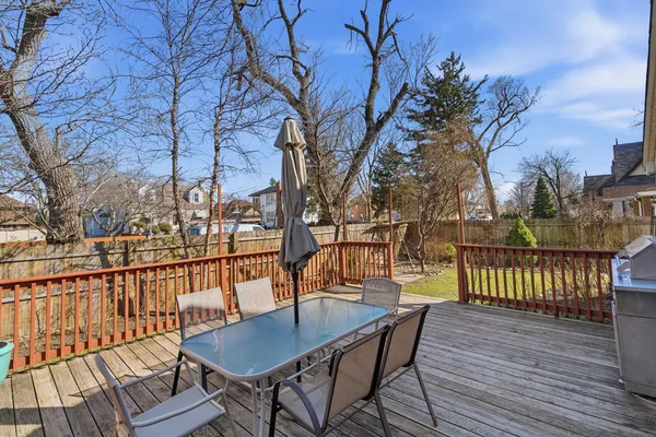 a view of a chairs on the roof deck