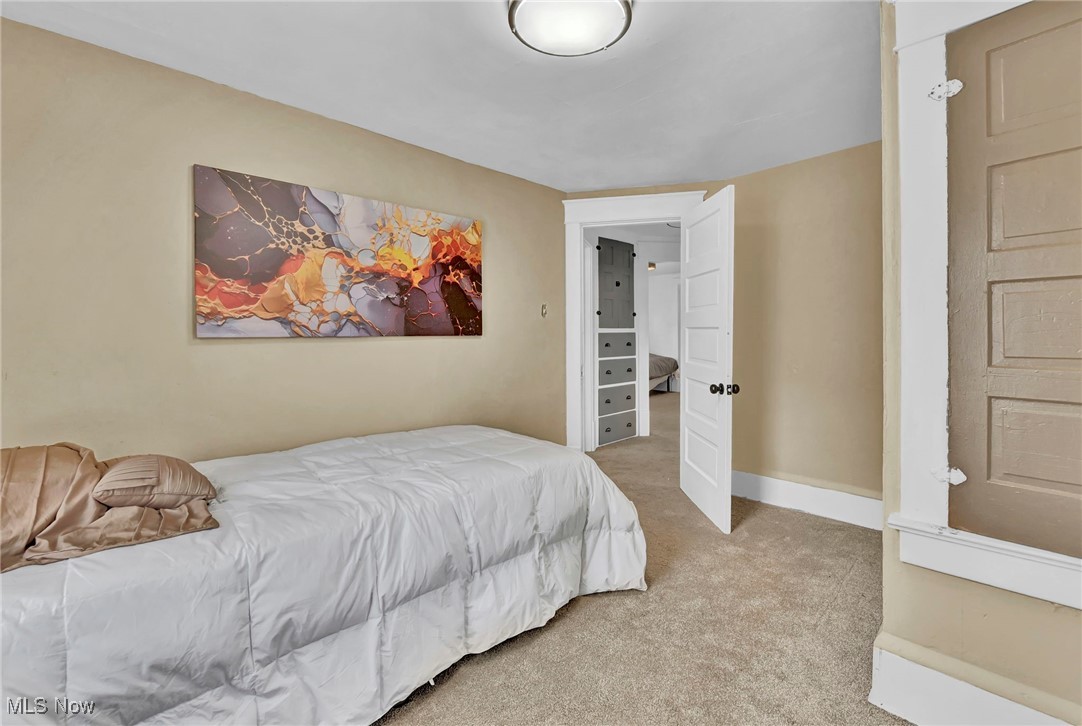 732 Carpenter Street Akron, OH 44310 - Photo 21 of 38 Carpeted bedroom featuring baseboards