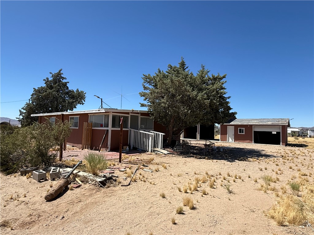 8051 7th Street Dolan Springs, AZ 86441 - Photo 65 of 65 a view of a house with snow on the road