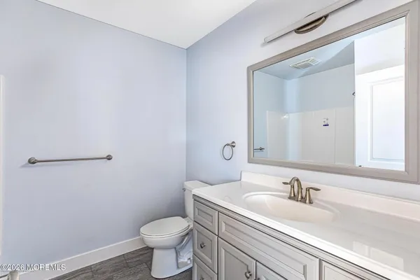 a bathroom with a sink and a toilet
