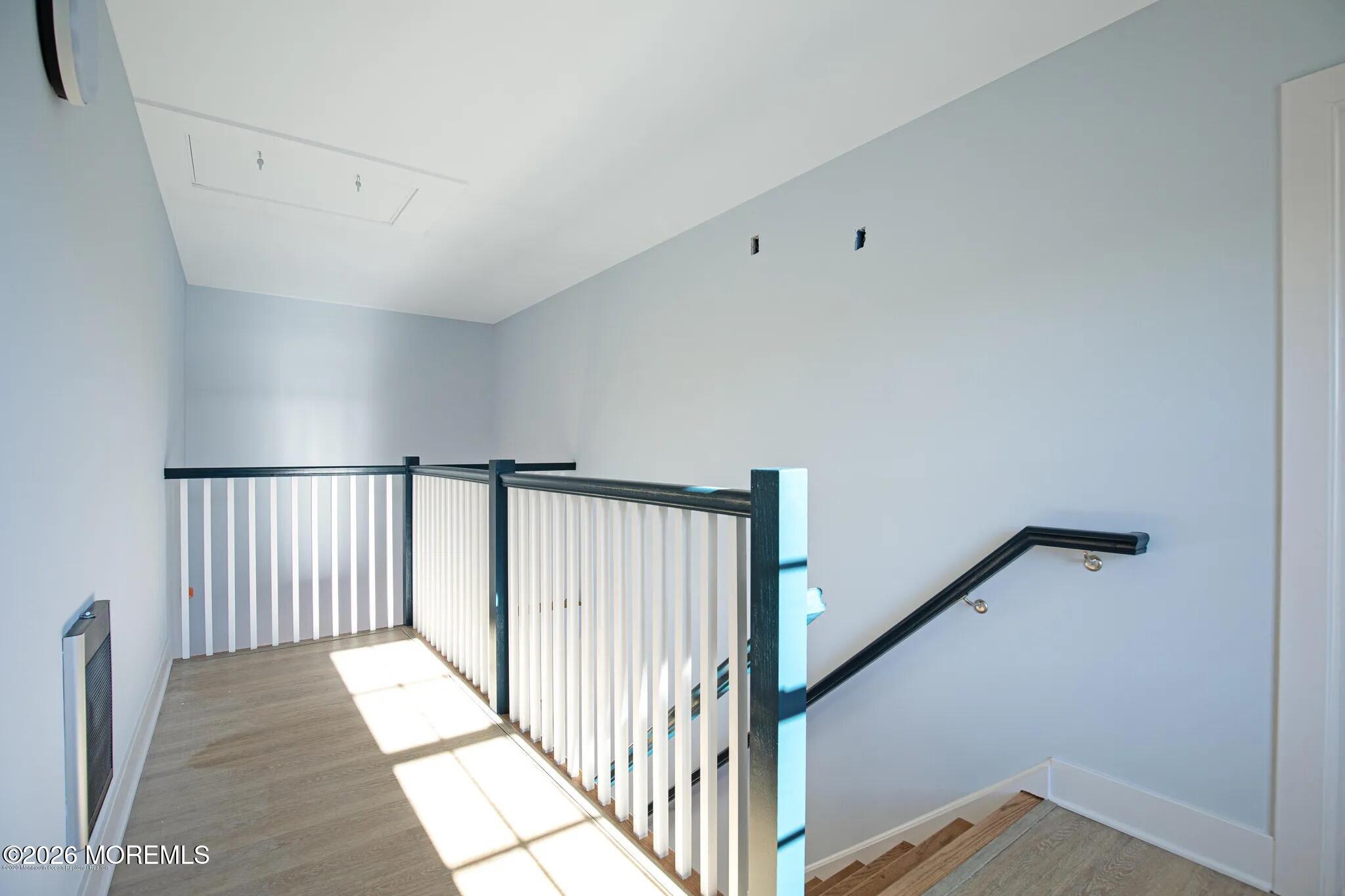 1009 Arnold Avenue, Unit 2A Point Pleasant, NJ 08742 - Photo 13 of 13 a view of a hallway with staircase