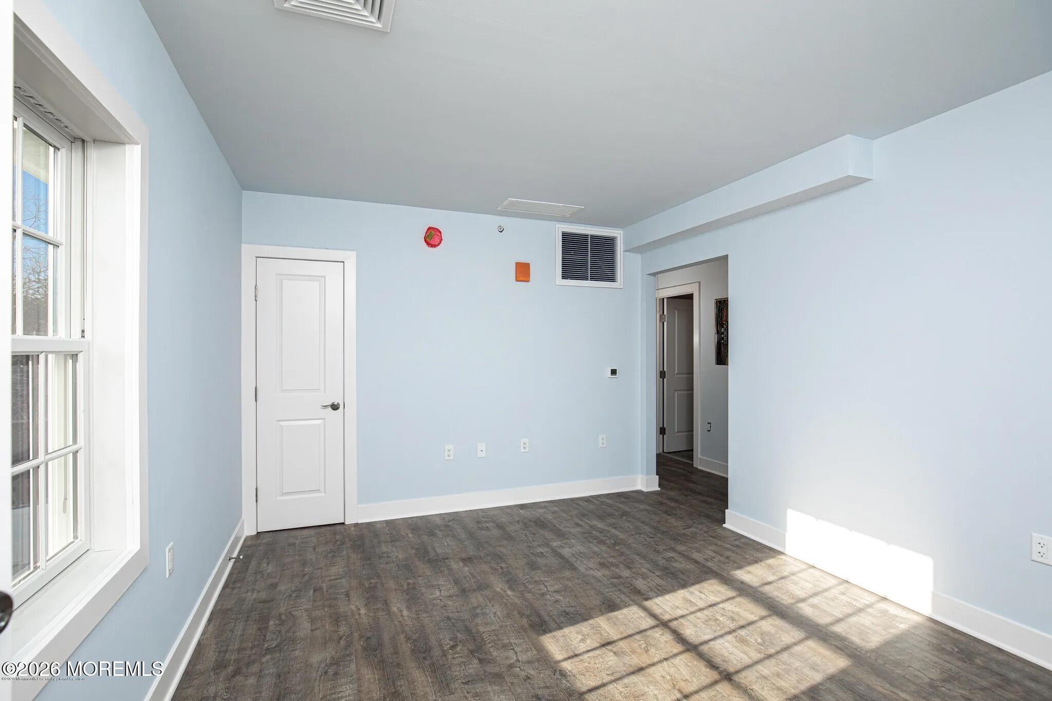 1009 Arnold Avenue, Unit 2A Point Pleasant, NJ 08742 - Photo 5 of 13 a view of livingroom with hallway and closet