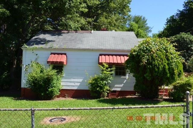 705 Penn Road Raleigh, NC 27604 - Photo 1 of 7 a front view of a house with a yard and potted plants