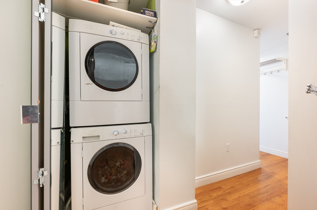 4 Charlesgate East, Unit 703 Boston, MA 02215 - Photo 8 of 15 a utility room with dryer and washer
