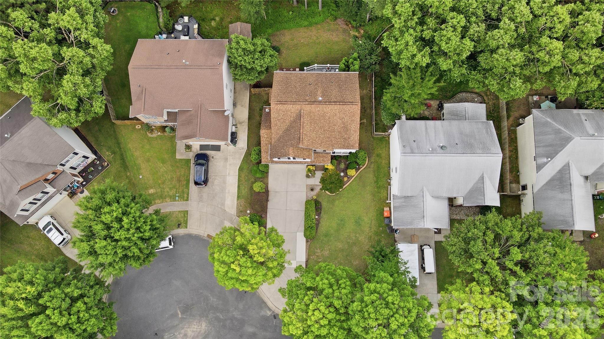 442 Sugar Maple Drive Tega Cay, SC 29708 - Photo 38 of 48 an aerial view of a house with a yard and outdoor seating
