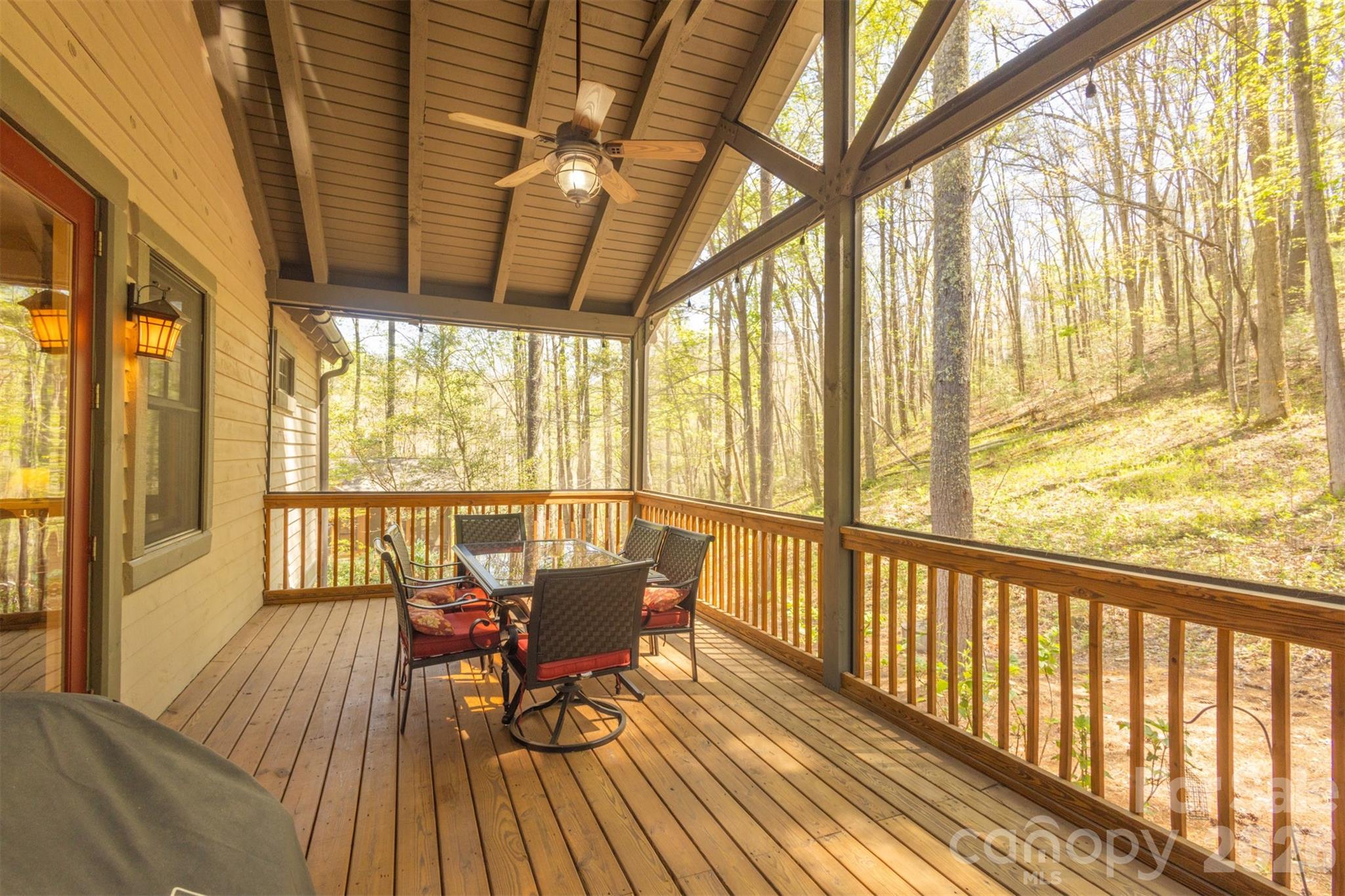 82 Mdw Rdg Court Tuckasegee, NC 28783 - Photo 13 of 39 a view of a chairs and table in the balcony