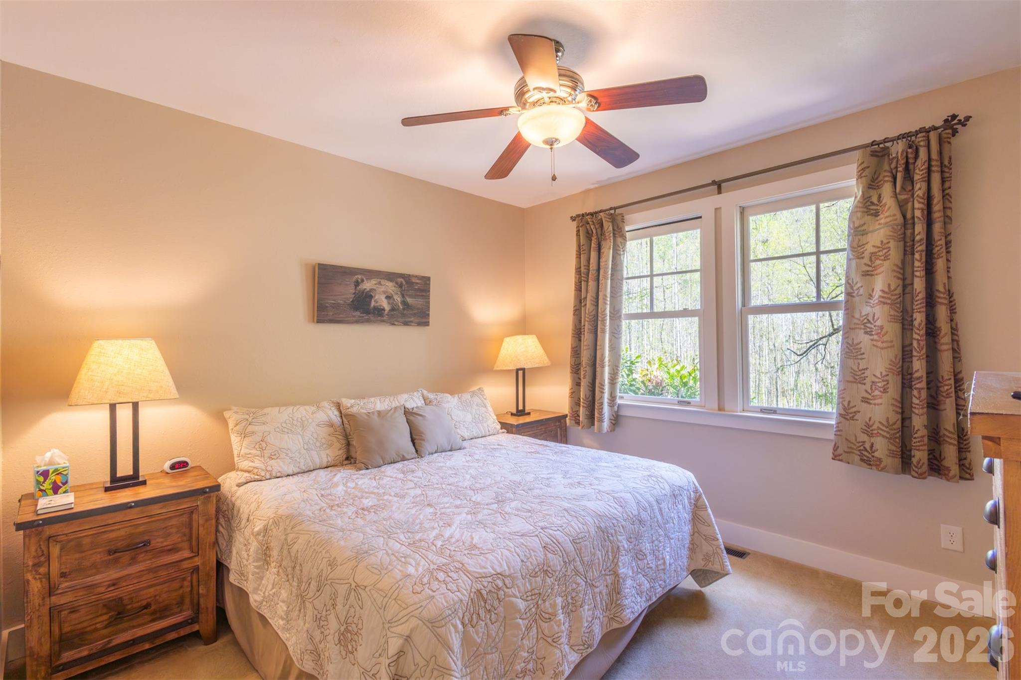 82 Mdw Rdg Court Tuckasegee, NC 28783 - Photo 19 of 39 a bedroom with a bed and a window