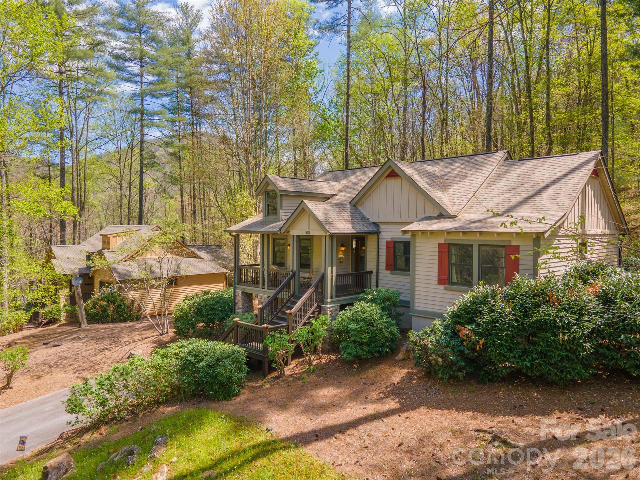 82 Mdw Rdg Court Tuckasegee, NC 28783 - Photo 2 of 39 a view of a house with a garden