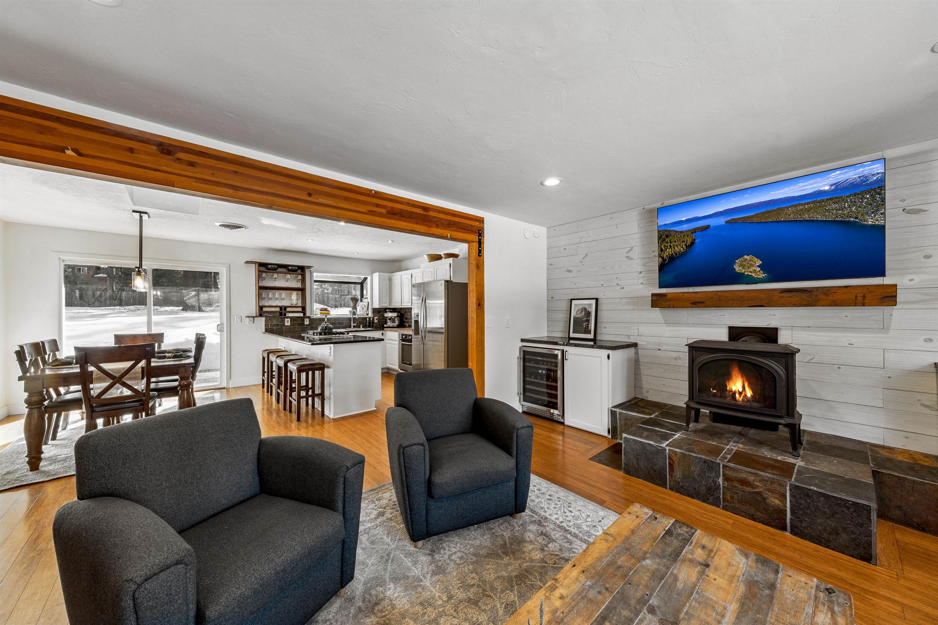 10895 Jeffery Pine Road Truckee, CA 96161 - Photo 9 of 25 a living room with furniture a fireplace and a flat screen tv