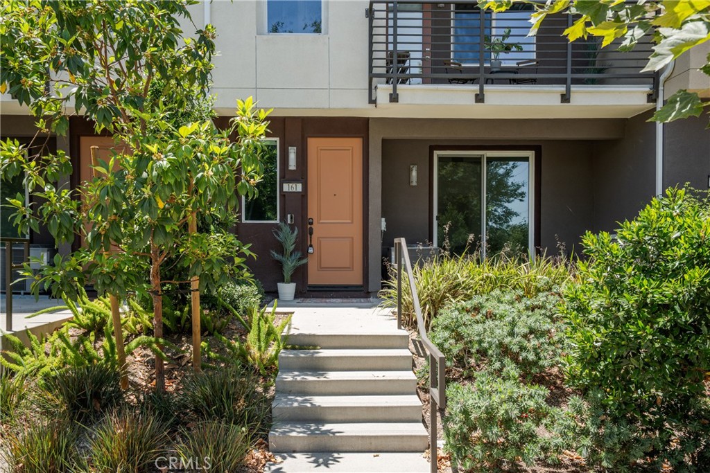 161 Steely Irvine, CA 92614 - Photo 30 of 35 a front view of a house with plants