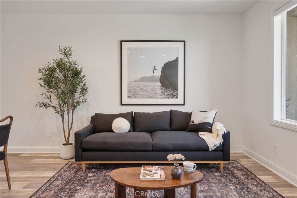 161 Steely Irvine, CA 92614 - Photo 3 of 35 a living room with furniture and a lamp
