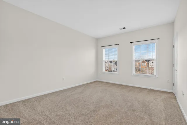 a bed room with a bed and a chandelier
