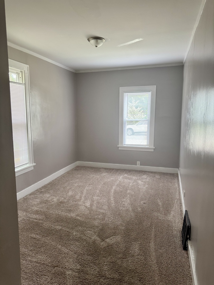 118 Wilcox Avenue Elgin, IL 60123 - Photo 12 of 29 a view of empty room with window