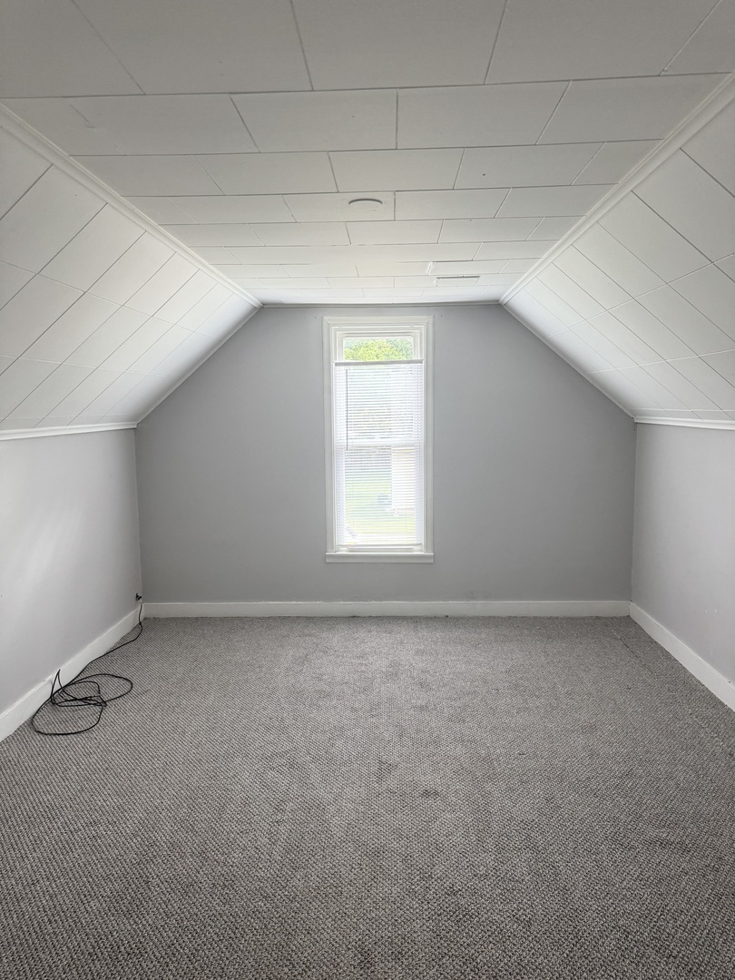 118 Wilcox Avenue Elgin, IL 60123 - Photo 21 of 29 a view of a room that has a window in it