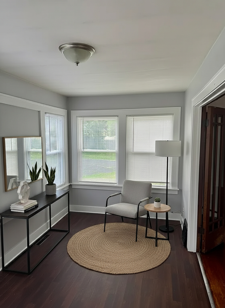 118 Wilcox Avenue Elgin, IL 60123 - Photo 3 of 29 a living room with furniture and a window