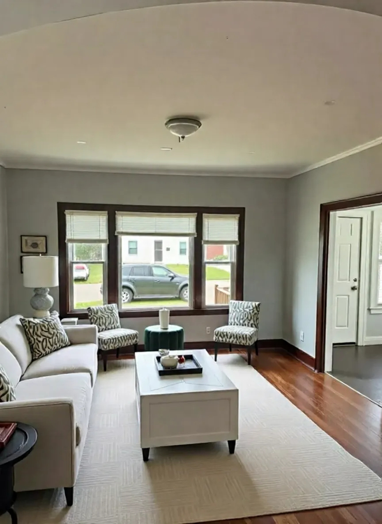 118 Wilcox Avenue Elgin, IL 60123 - Photo 5 of 29 a living room with furniture and a large window