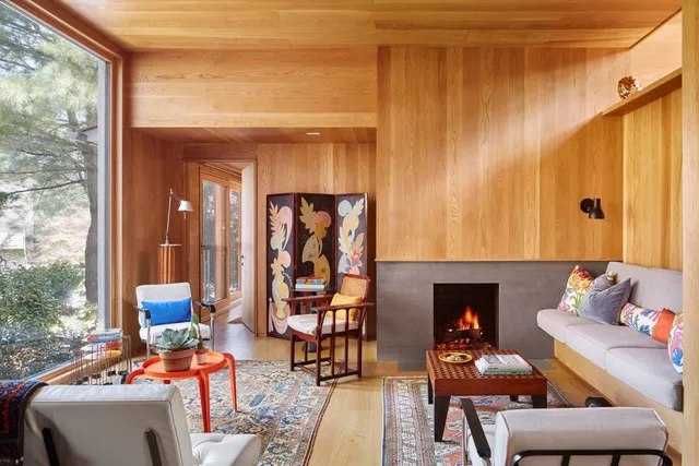 a outdoor living space with furniture and a fireplace