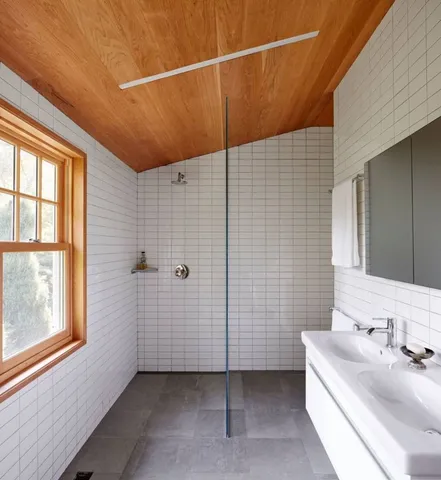 a view of a room with furniture and window